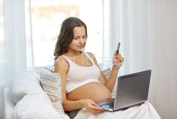 pregnant woman with laptop and ultrasound image Stock photo © dolgachov