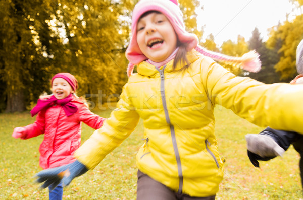 group of happy little kids running outdoors Stock photo © dolgachov