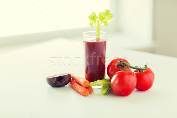 close up of fresh juice and vegetables on table Stock photo © dolgachov