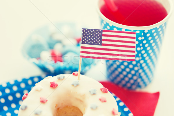 donut with juice and candies on independence day Stock photo © dolgachov