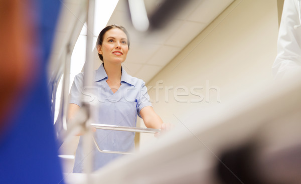 medic carrying hospital gurney at emergency Stock photo © dolgachov