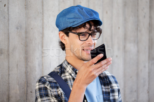 man recording voice or calling on smartphone Stock photo © dolgachov