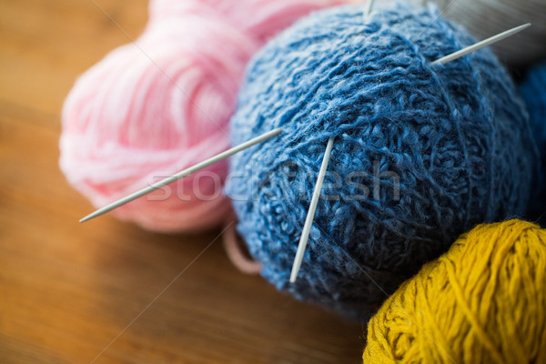 close up of knitting needles and yarn balls  Stock photo © dolgachov