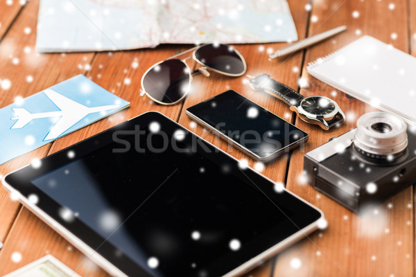 close up of smartphone and travel stuff Stock photo © dolgachov