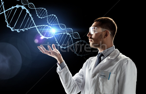 Om de ştiinţă lab strat ochelari de protectie ADN-ul ştiinţă genetica Imagine de stoc © dolgachov