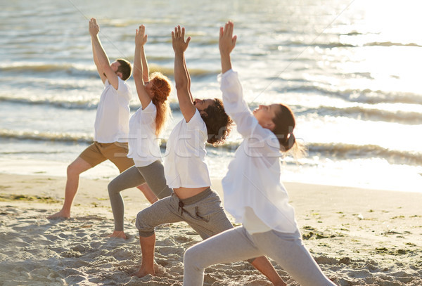 組人 瑜伽 海灘 健身 運動 商業照片 © dolgachov