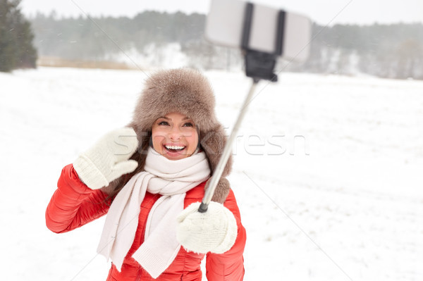 Stockfoto: Gelukkig · vrouw · stick · buitenshuis · winter · mensen