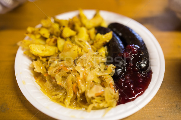 braised cabbage and sausages with sauce on plate Stock photo © dolgachov