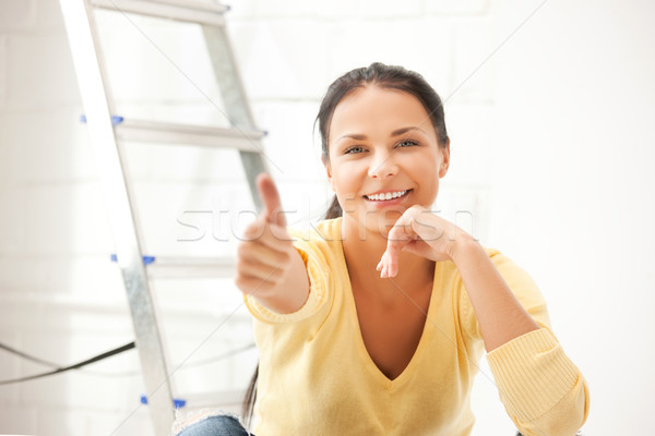 lovely housewife making repairing works Stock photo © dolgachov
