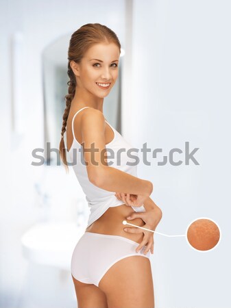 Nő néz narancsbőr kép mérőszalag lábak Stock fotó © dolgachov