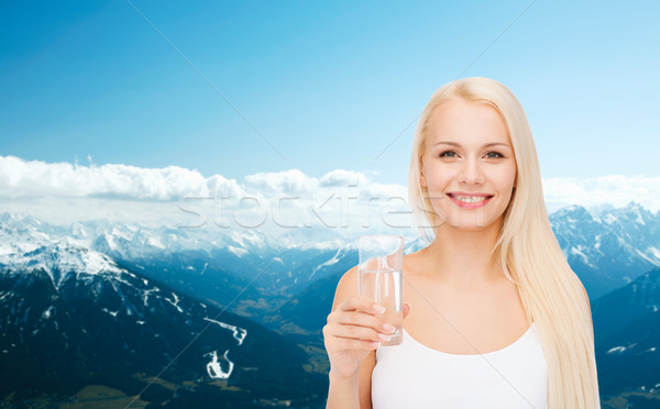 Jungen lächelnde Frau Glas Wasser Gesundheit Schönheit Stock foto © dolgachov
