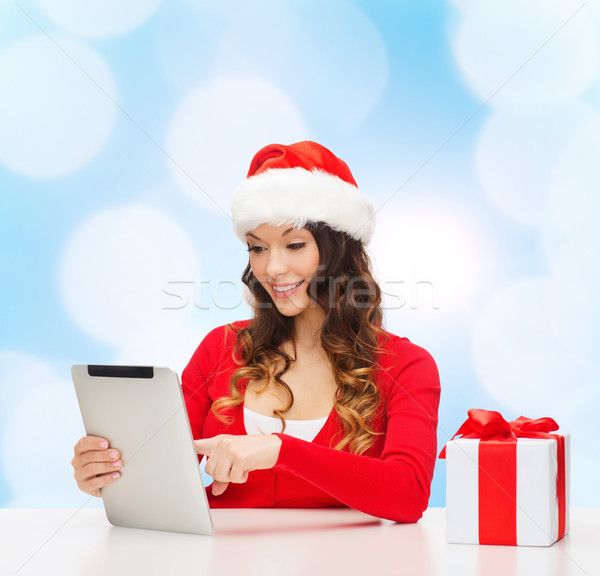 ストックフォト: 笑顔の女性 · サンタクロース · 帽子 · ギフト · クリスマス