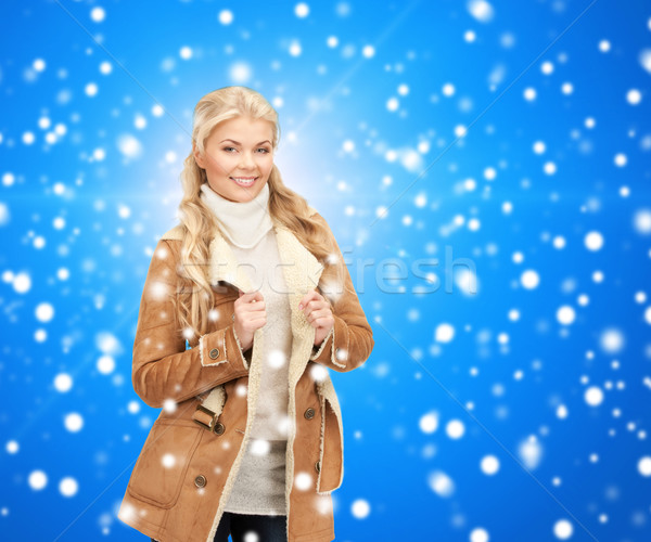 Stock photo: smiling young woman in winter clothes