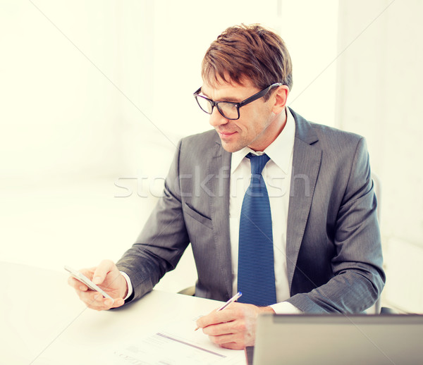Om de afaceri lucru laptop smartphone tehnologie afaceri Imagine de stoc © dolgachov