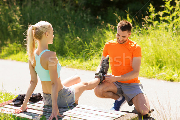happy couple with roller skates outdoors Stock photo © dolgachov