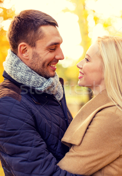 Souriant couple automne parc amour [[stock_photo]] © dolgachov