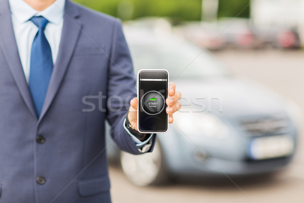 close up of business man with smartphone app Stock photo © dolgachov