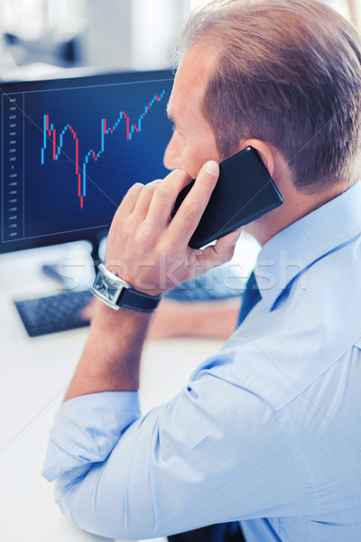 Zakenman smartphone kantoor business communicatie geld Stockfoto © dolgachov