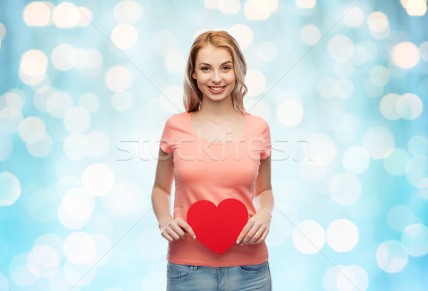 happy woman or teen girl with red heart shape Stock photo © dolgachov