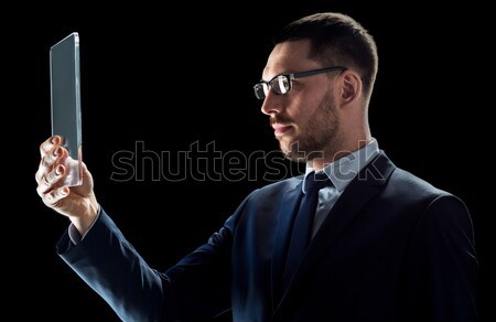 Imprenditore punta dito qualcosa invisibile uomini d'affari Foto d'archivio © dolgachov