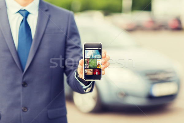 close up of business man with smartphone media Stock photo © dolgachov