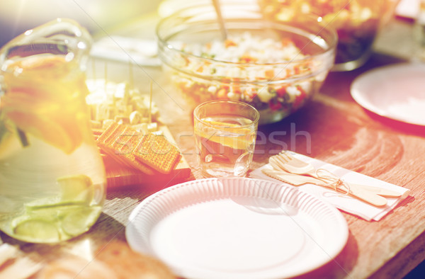table with food for dinner at summer garden party Stock photo © dolgachov