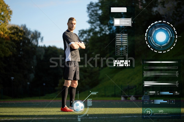 Footballeur balle terrain de football sport technologie personnes [[stock_photo]] © dolgachov