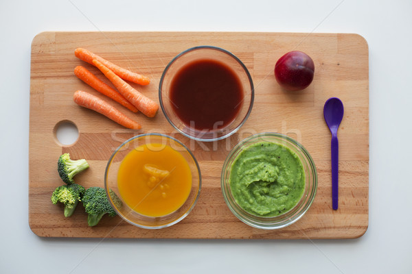 vegetable puree or baby food in glass bowls Stock photo © dolgachov