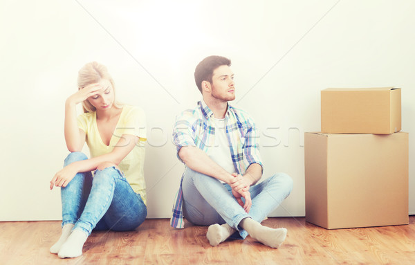 Stock photo: unhappy couple having argument at home