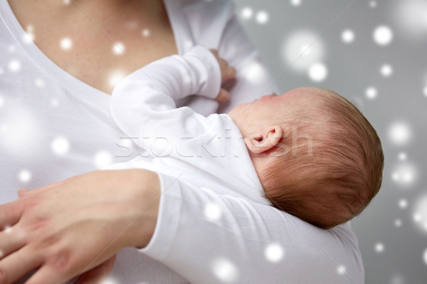 Közelkép anya tart újszülött baba család Stock fotó © dolgachov