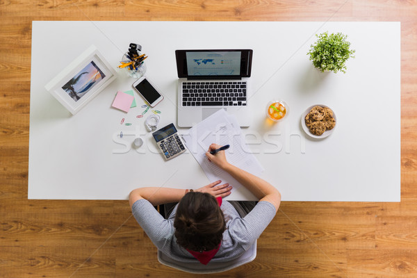 hands with calculator and papers at office table Stock photo © dolgachov