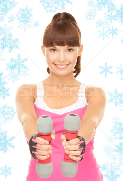 Fitness instructeur haltères blanche femme neige [[stock_photo]] © dolgachov