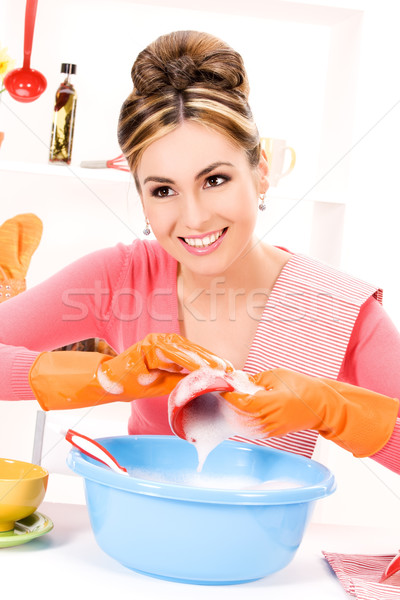 Stock photo: housewife washing dish