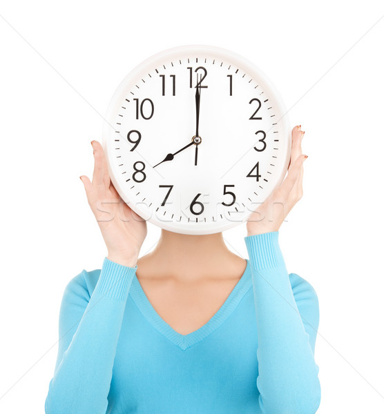 businesswoman with clock over her face Stock photo © dolgachov
