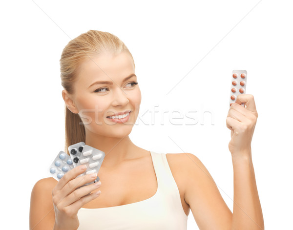 Jonge vrouw pillen foto variëteit vrouw gezondheid Stockfoto © dolgachov