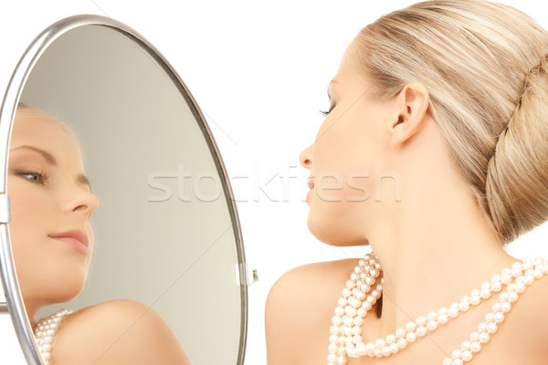 woman with pearl necklace Stock photo © dolgachov