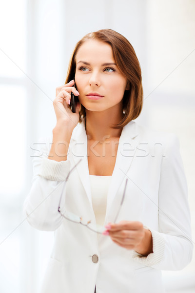 [[stock_photo]]: Femme · d'affaires · smartphone · bureau · affaires · communication · téléphone