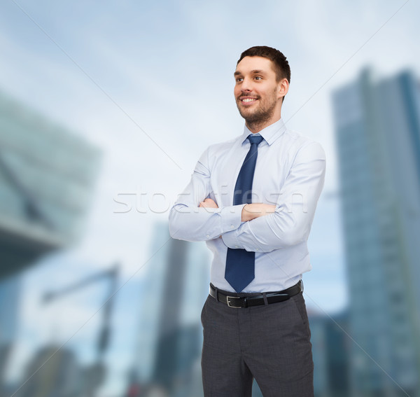 handsome businessman with crossed arms Stock photo © dolgachov