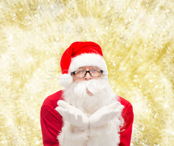 man in costume of santa claus Stock photo © dolgachov