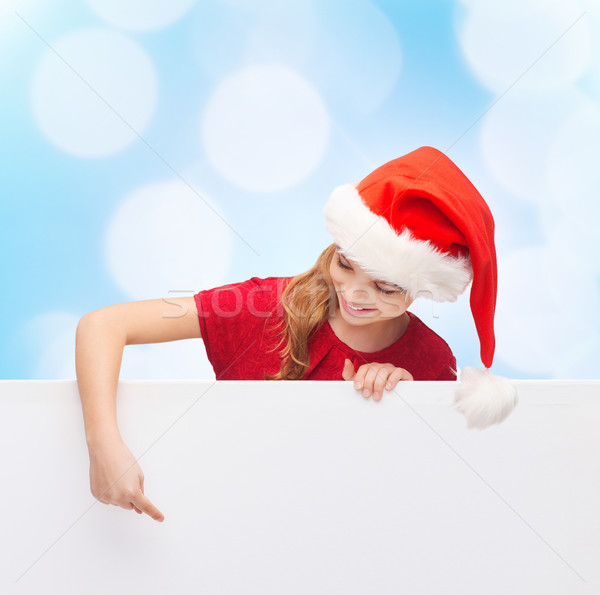 Fille helper chapeau Noël Photo stock © dolgachov