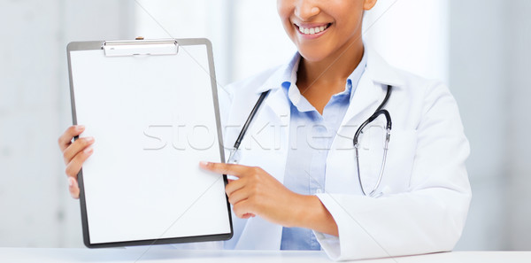 Médico prescrição médico feminino estetoscópio Foto stock © dolgachov