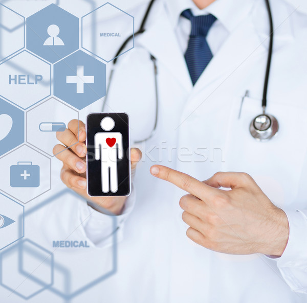 Médico do sexo masculino estetoscópio virtual tela saúde médico Foto stock © dolgachov