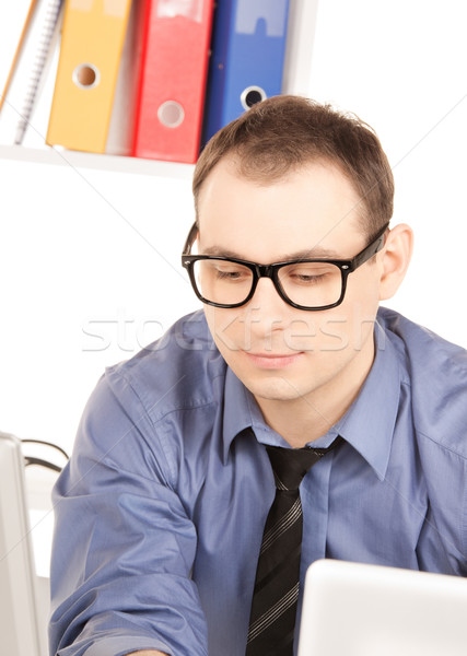 Stock photo: businessman with laptop computer in office