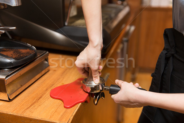 close up of woman making coffee by machine at cafe Stock photo © dolgachov