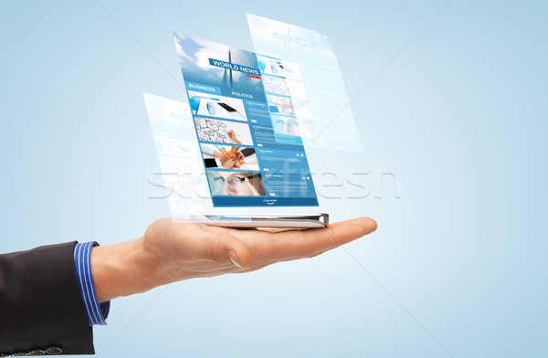 Mannelijke hand smartphone wereld nieuws mensen Stockfoto © dolgachov