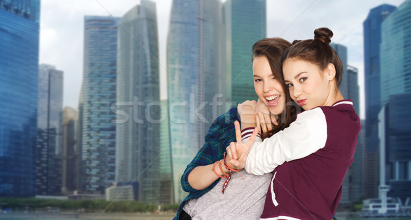 Heureux adolescentes paix signe [[stock_photo]] © dolgachov