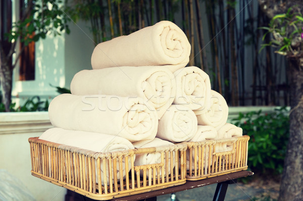 rolled bath towels at hotel spa Stock photo © dolgachov