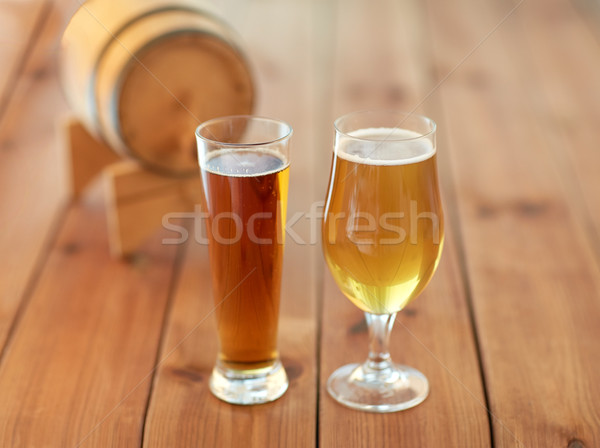 Stock photo: close up of different beers in glasses on table