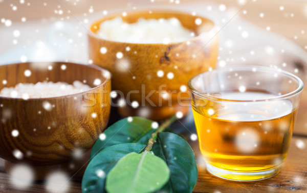 close up of honey in glass with leaves on wood Stock photo © dolgachov