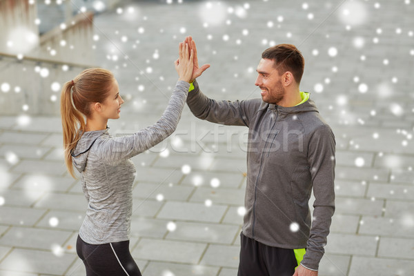 Szczęśliwy para high five odkryty fitness sportu Zdjęcia stock © dolgachov